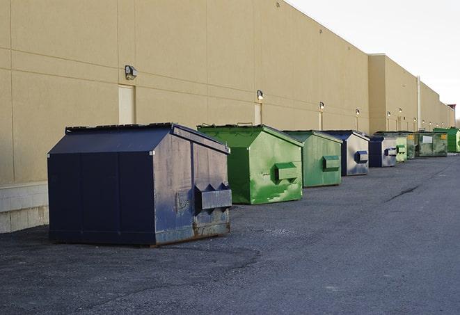 a fleet of red and blue construction dumpsters available for use in Lake Sherwood, CA